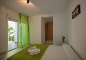 Voodi või voodid majutusasutuse Apartamentos Turísticos Zahazar toas