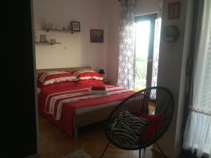 Postel nebo postele na pokoji v ubytování Apartments Stojanovic