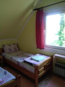 Postel nebo postele na pokoji v ubytování Apartments Obradović Milan