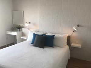 Ein Bett oder Betten in einem Zimmer der Unterkunft Sunrise Creek