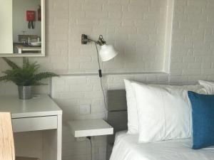 Ein Bett oder Betten in einem Zimmer der Unterkunft Sunrise Creek