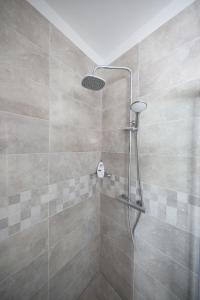 Łazienka w obiekcie Apartmani Postimana