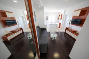Telewizja i/lub zestaw kina domowego w obiekcie Apartmani Postimana