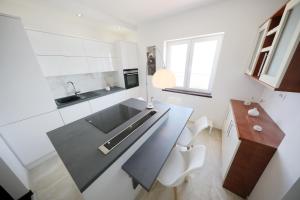Kuchnia lub aneks kuchenny w obiekcie Apartmani Postimana