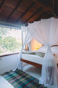 Ένα ή περισσότερα κρεβάτια σε δωμάτιο στο Casa Crescente