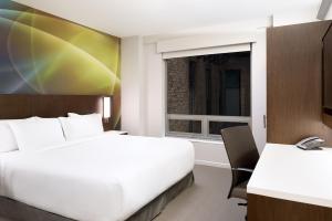 Cama ou camas em um quarto em LUMA Hotel - Times Square mais 37 fotos
