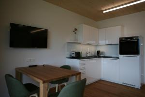 Eldhús eða eldhúskrókur á Apart-Faakersee