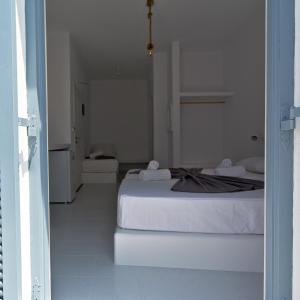 Posteľ alebo postele v izbe v ubytovaní Teoria Paros - Matsas Windmill