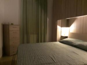Letto o letti in una camera di O lastraco