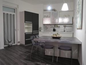 A kitchen or kitchenette at Romeo&Juliet's Nest in Verona
