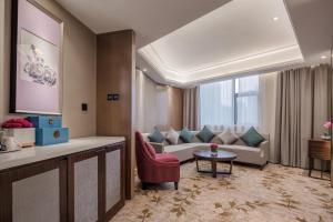 Uma área de estar em Wuhan Hongguang Hotel
