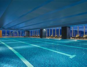 a swimming pool on the floor of a building at Shangri-La Ulaanbaatar in Ulaanbaatar
