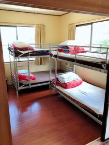 Кровать или кровати в номере Nikko Park Lodge Tobu Station