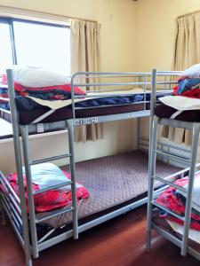 Кровать или кровати в номере Nikko Park Lodge Tobu Station