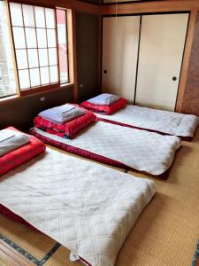 A bed or beds in a room at Nikko Park Lodge Tobu Station