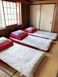 Tempat tidur dalam kamar di Nikko Park Lodge Tobu Station