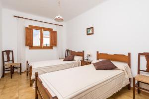 Postel nebo postele na pokoji v ubytování Barcelo-Danus