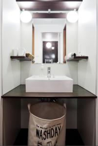 a bathroom with a sink and a mirror at The Wonder At Stay-Tengachaya- in Osaka +52 photos