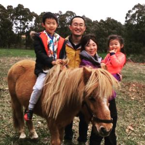 a man and two children riding on a horse at Dingup House in Manjimup