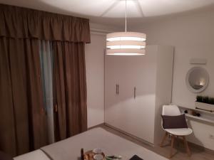 Postel nebo postele na pokoji v ubytování Villa Zoe