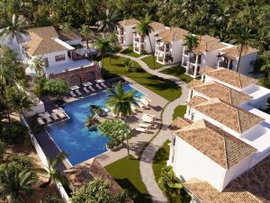 an aerial view of a villa with a swimming pool at Andores Resort And Spa - Calangute in Calangute +30 photos
