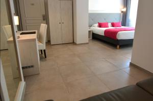 Postel nebo postele na pokoji v ubytování Hôtel A Madonetta