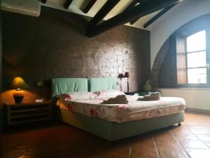 Postel nebo postele na pokoji v ubytování B&B Il Martin Pescatore