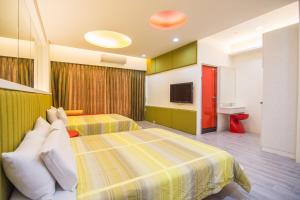 Katil atau katil-katil dalam bilik di Little SkyLark B&B