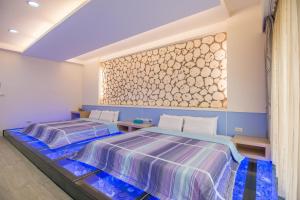 Katil atau katil-katil dalam bilik di Little SkyLark B&B