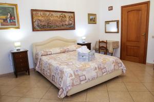 Posteľ alebo postele v izbe v ubytovaní B&B Maria Piddu
