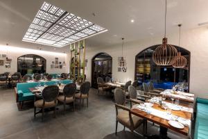 En restaurant eller et andet spisested på Andores Resort And Spa - Calangute