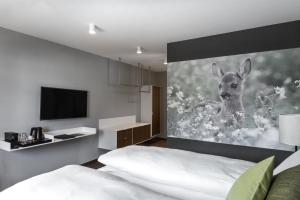 Katil atau katil-katil dalam bilik di Hotel Mischun