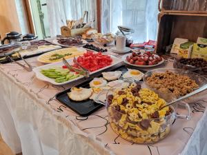 a table with many different types of food on it at Empera H-l in Sunny Beach