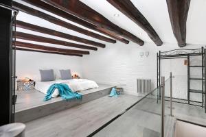 A bed or beds in a room at Gracia 1872