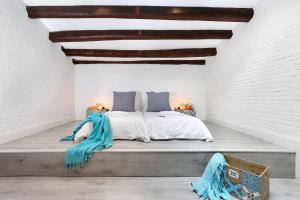 A bed or beds in a room at Gracia 1872