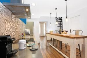 A kitchen or kitchenette at Gracia 1872