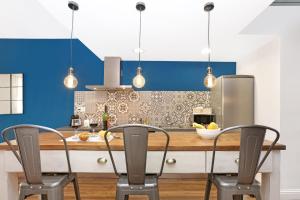 A kitchen or kitchenette at Gracia 1872