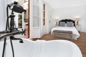 A bed or beds in a room at Gracia 1872