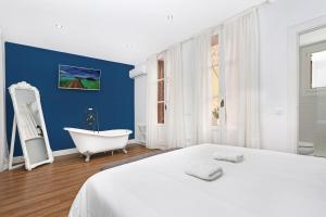 A bed or beds in a room at Gracia 1872