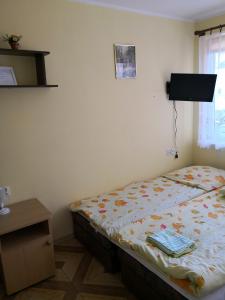 Postel nebo postele na pokoji v ubytování Pokoje wakacyjne - Wizygran