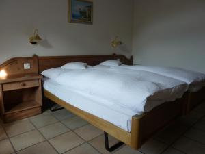 Letto o letti in una camera di Gasthof Löwen