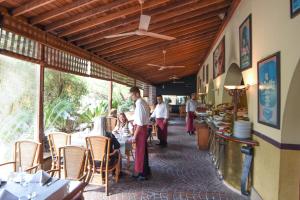 Un restaurant sau alt loc unde se poate mânca la Portemilio Hotel & Resort