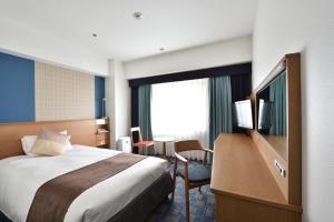Letto o letti in una camera di Hotel Granvia Hiroshima