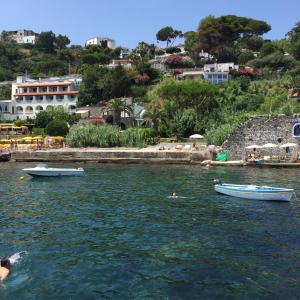 a number of boats in a body of water at Hotel Don Felipe in Ischia
