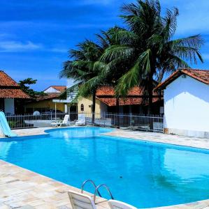 A piscina localizada em Hotel Pousada Chalé do Coqueiral ou nos arredores