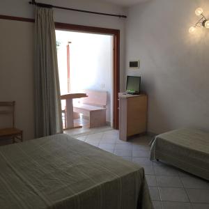 Ένα ή περισσότερα κρεβάτια σε δωμάτιο στο Residence Dolores +51 φωτογραφίες