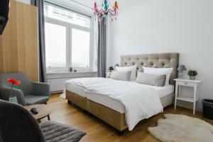 Postel nebo postele na pokoji v ubytování Villa Cuchema