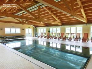 The swimming pool at or close to Alpendorf Dachstein West by ALPS RESORTS