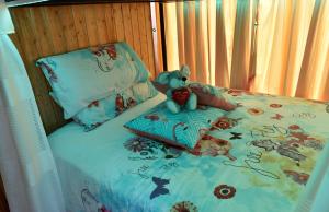 Łóżko lub łóżka w pokoju w obiekcie Apartamentos Los Delfines