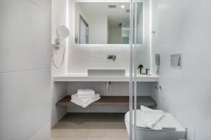 Koupelna v ubytování Hotel Palmyra